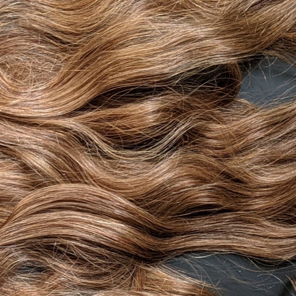 19" clip in Remy human hair extensions dark blonde